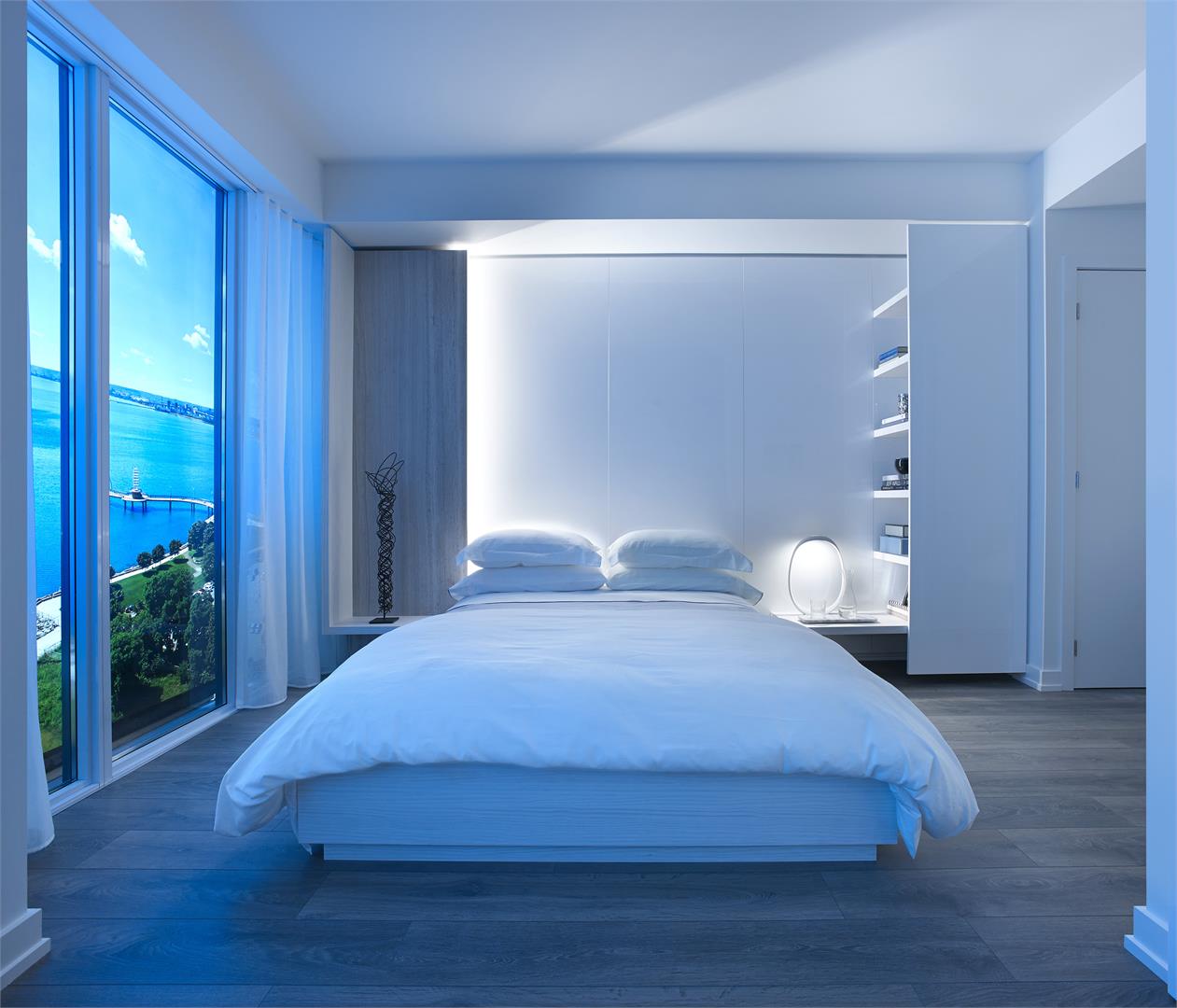 Rendering of Nautique Lakefront Residences suite bedroom at night.