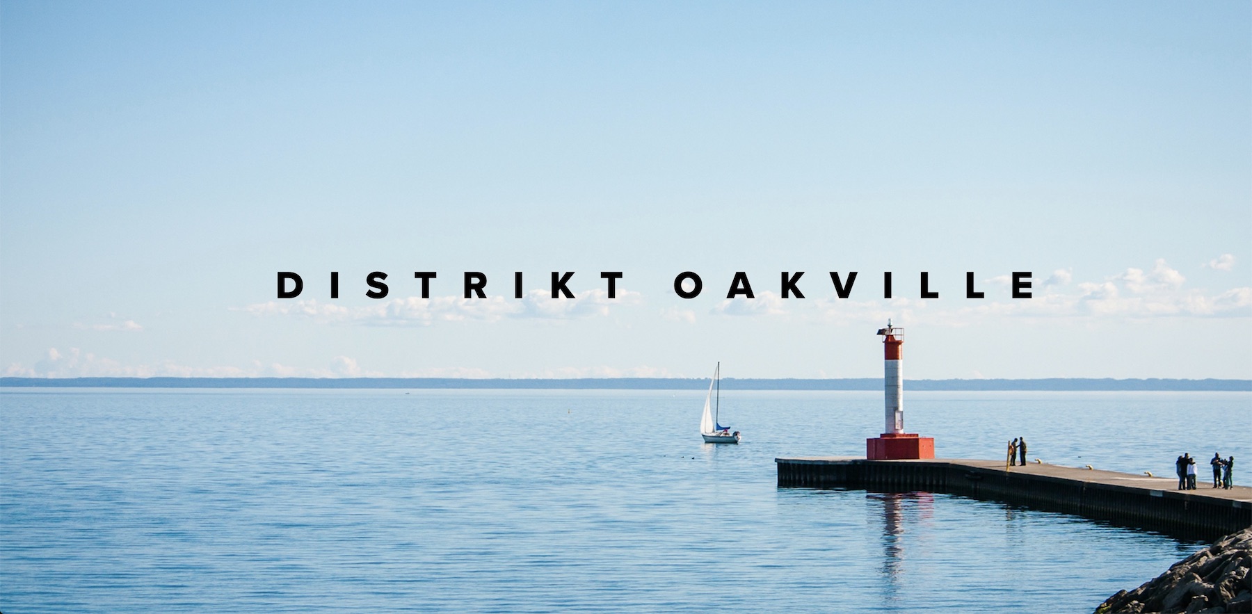 Distrikt Oakville text with Lake Ontario background