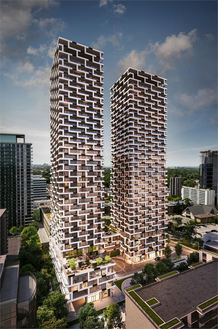Exterior rendering of Sixty-Five Broadway Condos in the evening.