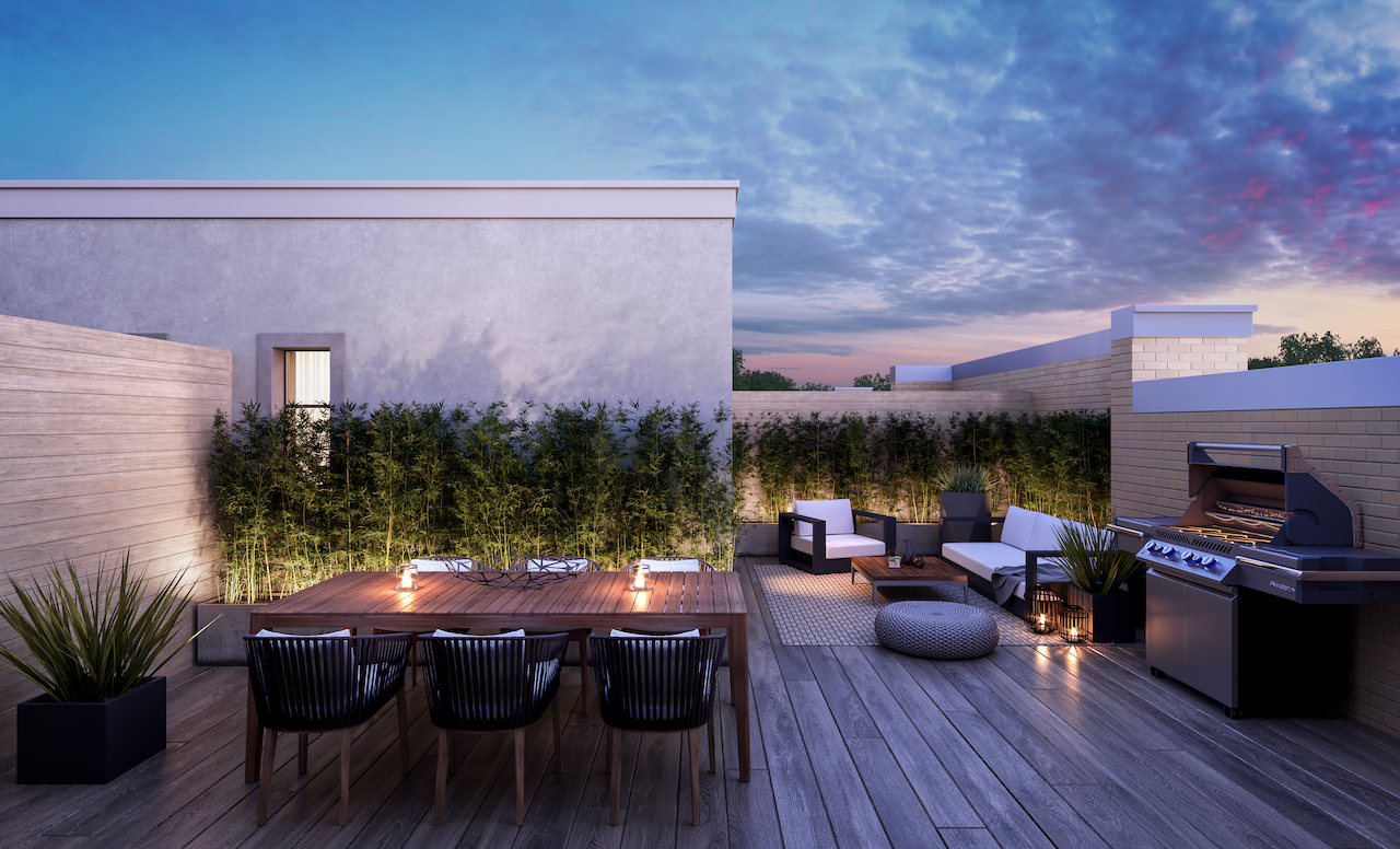 Exterior rendering of The Bond towns rooftop patio at dusk.