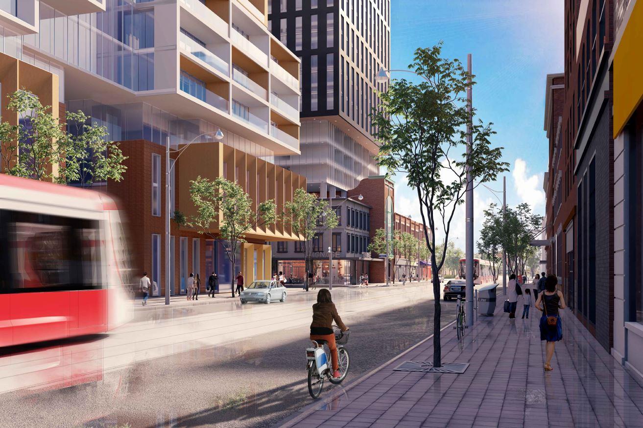 Rendering of street level with bike rider and street car passing 90 Queen Street East Condos.