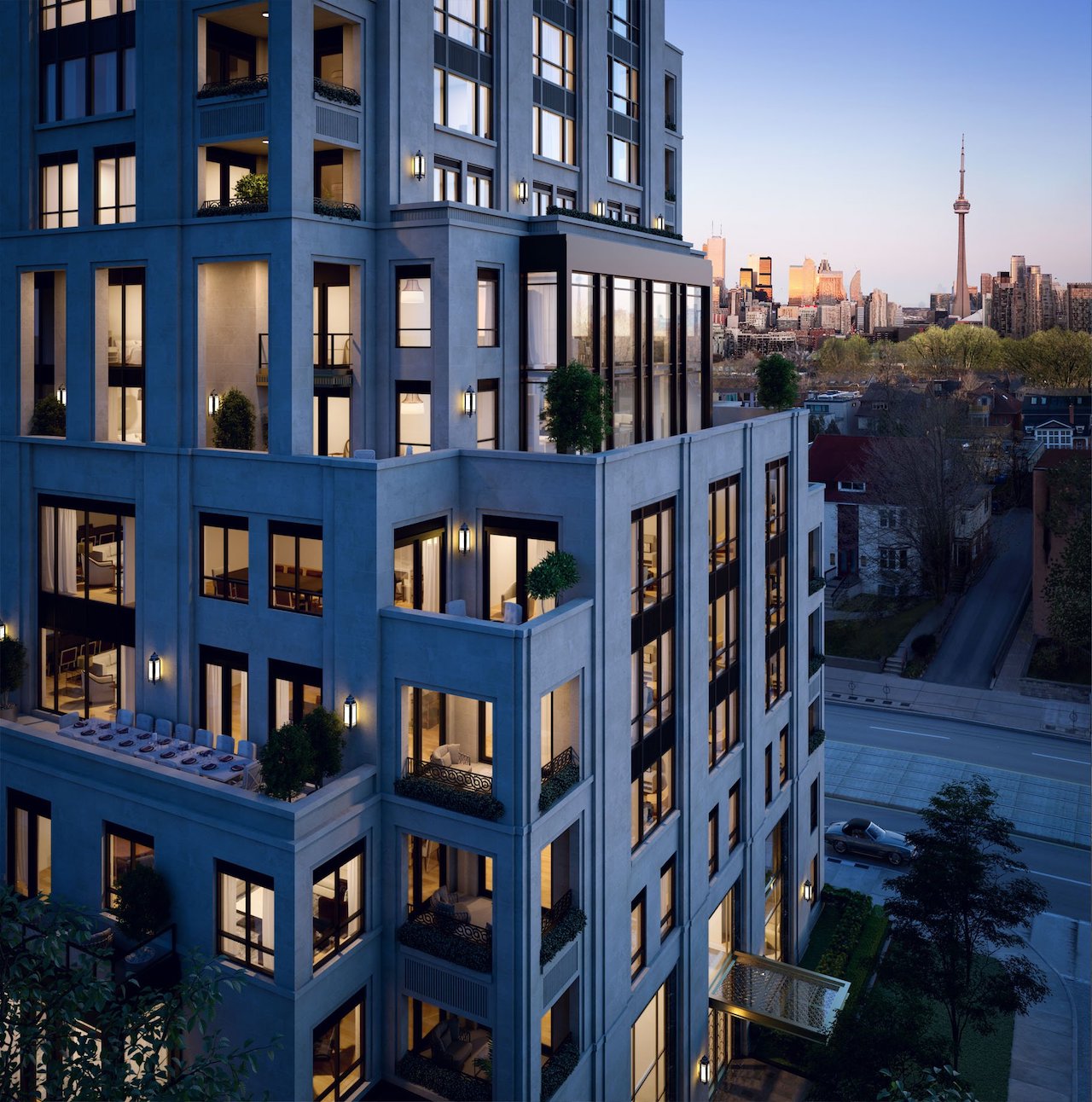 Partial exterior rendering of One Forest Hill Condos at night.