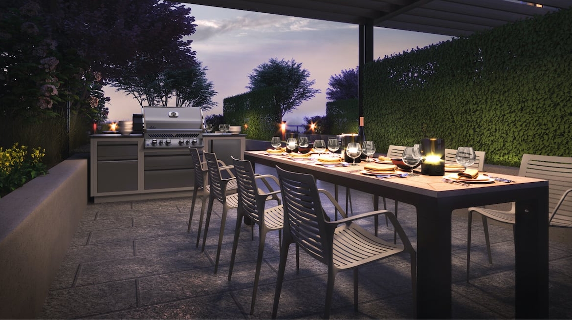 Rendering of Westerly Condos outdoor dining and bbq at night
