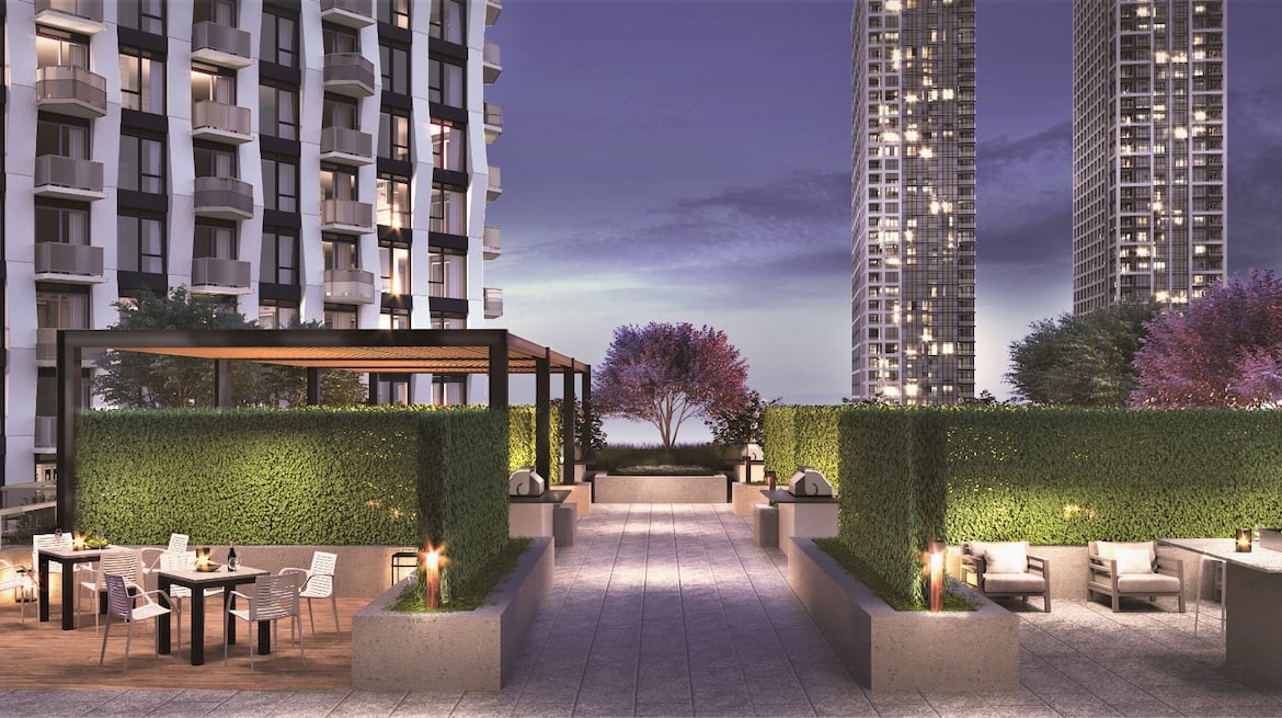 Rendering of Westerly Condos terrace with seating at night
