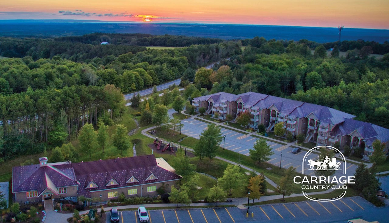 Aerial of Carriage Ridge Resort at Horseshoe Valley in the evening