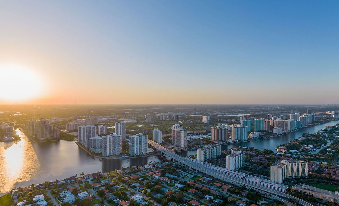 St. Regis Residences Sunny Isles Beach rooftop view of the north west golden hour