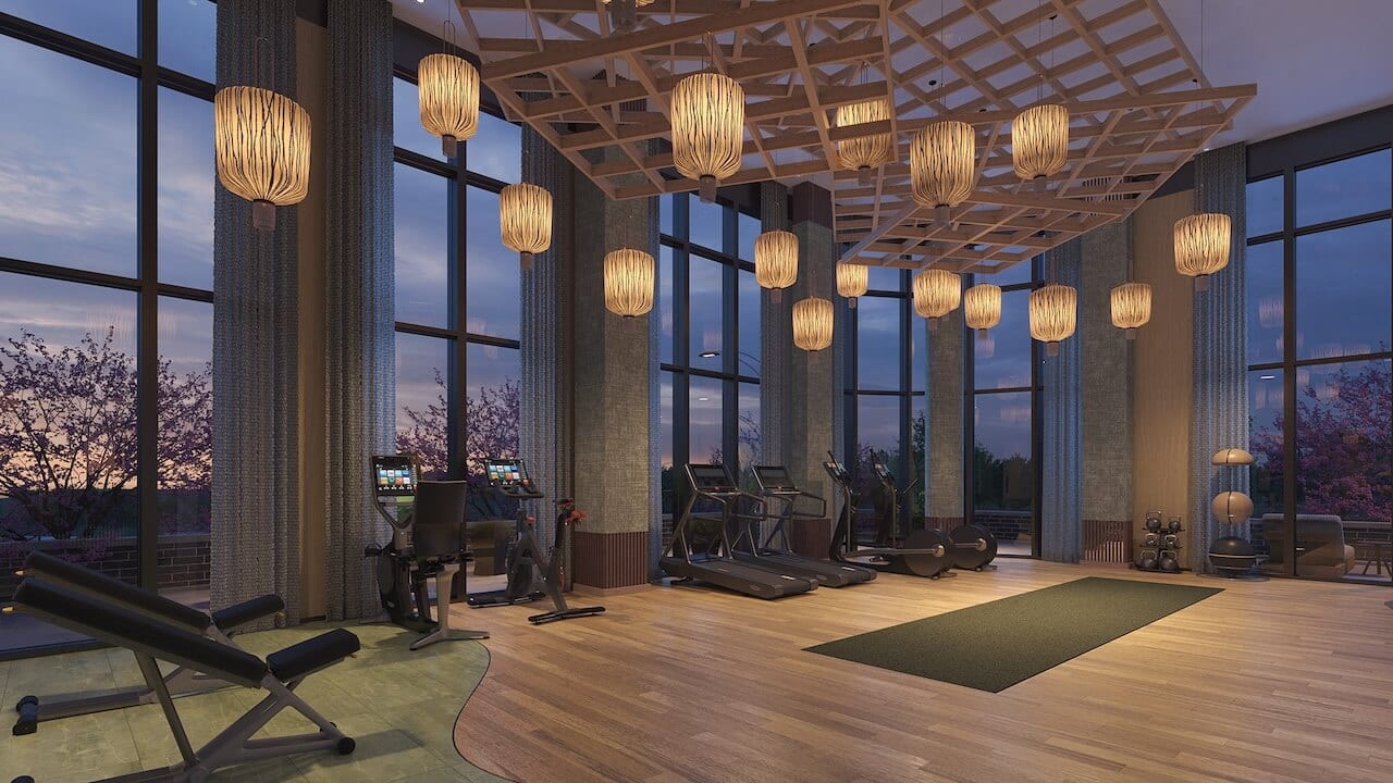 Rendering of Lily at Crosstown Condos gym at night