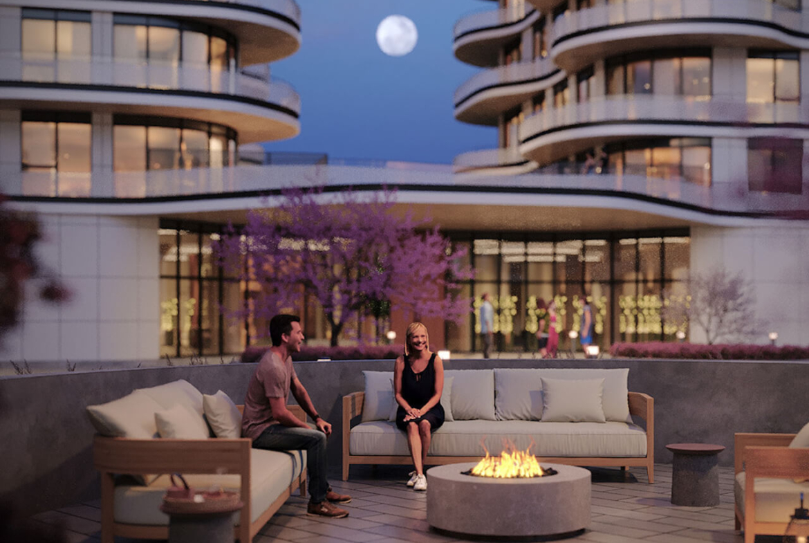 Rendering Lily Condos at Crosstown outdoor fire pit at night
