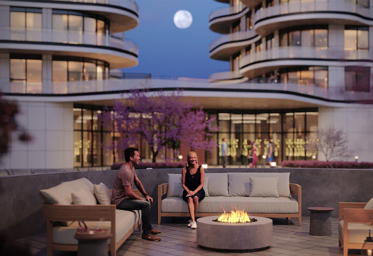 Rendering Lily Condos at Crosstown outdoor fire pit at night
