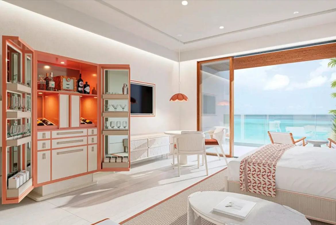 Chic bedroom interior at Vie L'Ven with a custom bar area, highlighting luxury living in St. Maarten.